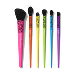 Blend bright 7- piece face & eye brush set, all of the brushes have a tiger pattern on the top; first, the blush brush is pink, then the Highlighter Brush color orange, the Firm Shadow Brush color yellow, Pointed Deluxe Blender Brush color green, Round Blender Brush color blue and the Tapered Mini Blending Brush color purple.