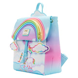 Markie™ Reflection Mini Backpack side view, on the front, Markie and Celeste™ take a refreshing sip of water from a reflective lake and some clouds in the background, and on the side, the colors pink and purple fade. A bold and bright rainbow shines up above the top flap of the backpack. The rainbow cloud zipper will unveil a hidden pocket within the arch.