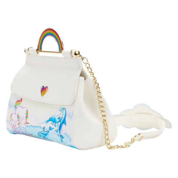 Markie™ Reflection Crossbody Bag, side view on the front, Markie and Celeste™ take a refreshing sip of water from a reflective lake where the Dancing Dolphins™ play in a white background. As they rest in the clouds, a bold and bright rainbow shines above on the bag’s molded handle. A dreamy cloud-shaped shoulder pad continues the magic on top of the shiny gold chain shoulder strap.