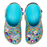 Kids´ classic Lisa Franck clog, view from the top; each shoe is decked out in signature Lisa Frank designs with colorful hearts on a blue background and includes a whimsical and wonderful collection of Jibbitz™ charms. The left one has the heart that says love, a butterfly, purple, green, pink, and blue diamonds, and a flower; the left one has a flower, a shooting star in rainbow colors, a bag that says Lisa Frank, and the color diamonds purple, pink, and blue.
